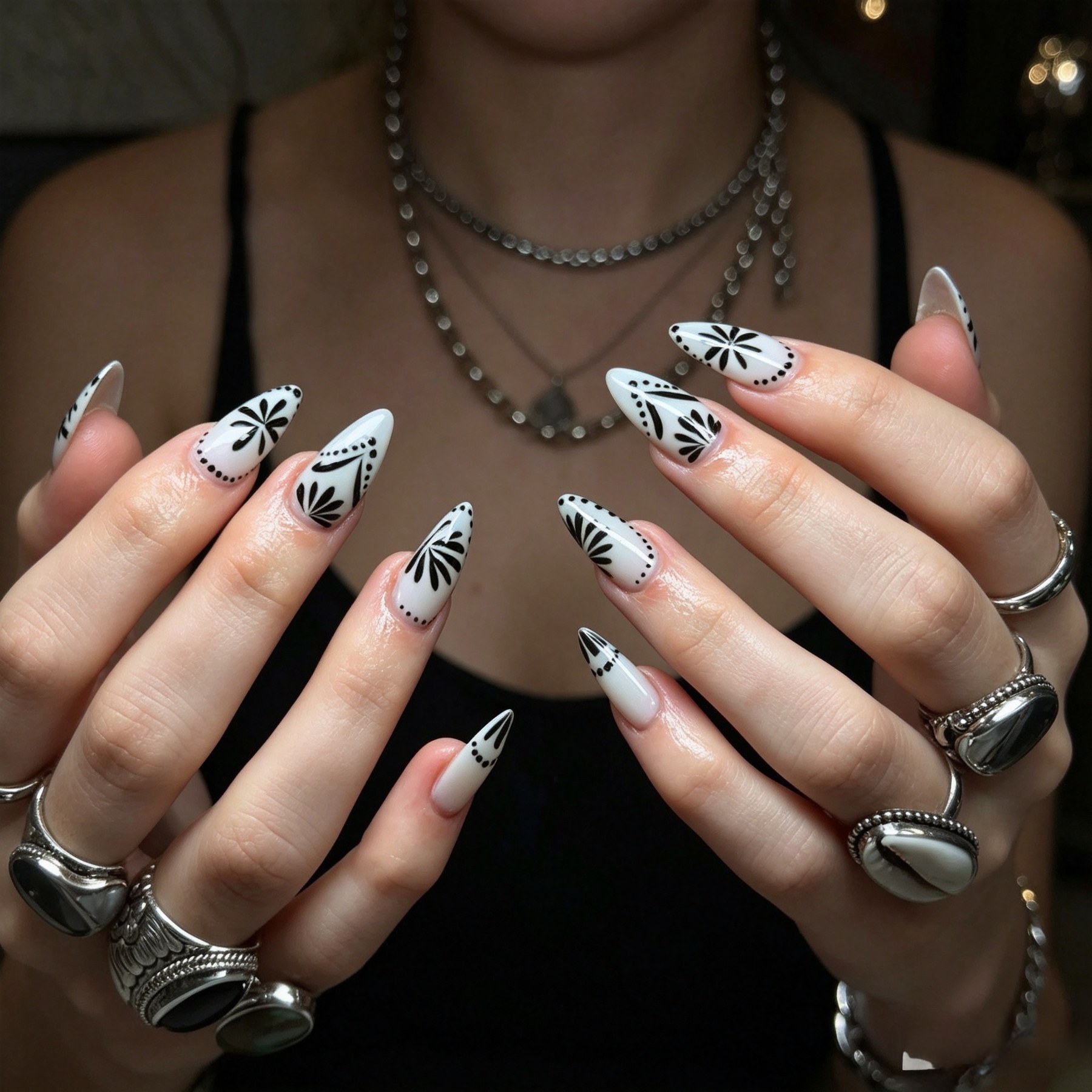 Black linework starburst nail art